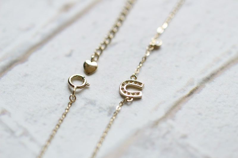 HORSESHOE CHARM BRACELET - Luminous Amore