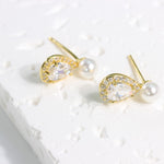 Load image into Gallery viewer, OVAL CUBIC ZIRCONIA WITH PEARL STUD EARRINGS - Luminous Amore
